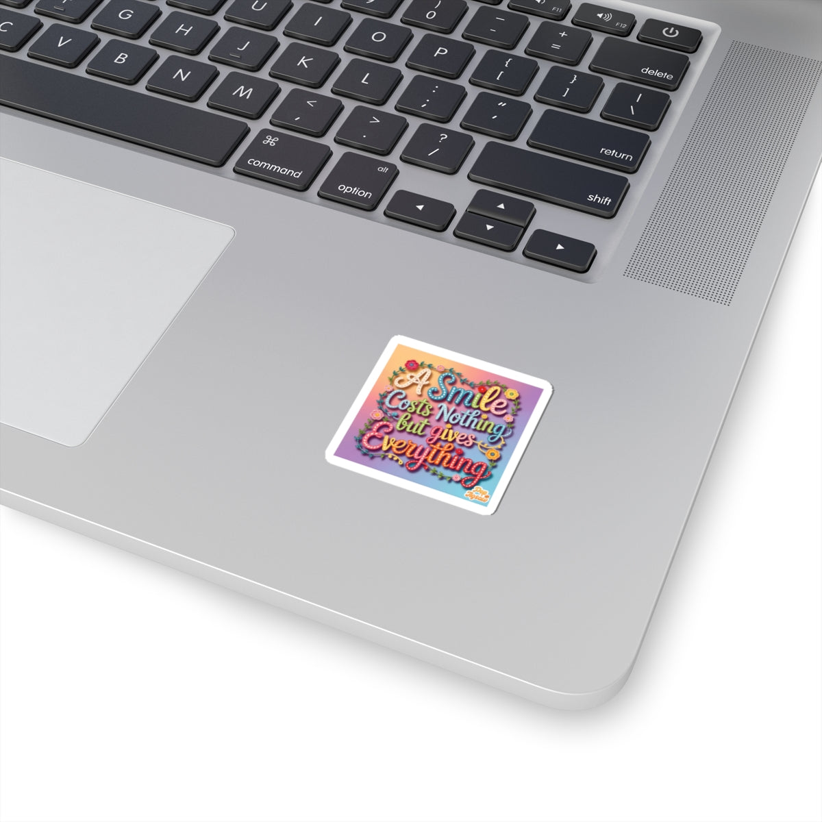 Sticker — "A Smile Costs Nothing But Gives Everything" Colorful Inspirational Kiss-Cut Sticker